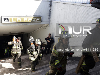 January 6, 2023, Mexico City, Mexico: At the La Raza station of the Mexico City Metro, rescue squads work at the scene after two cabins of t...