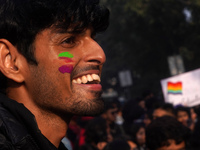 A participant with a rainbow painted face takes part in the annual Delhi Queer Pride March, an event promoting lesbian, gay, bisexual and tr...