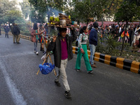 A street food vendor rushes for customers during the annual Delhi Queer Pride March, an event promoting lesbian, gay, bisexual and transgend...