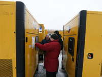 Pierre Vauthier (Head of FAO Ukraine country office) inspects diesel generators provided by the Germany government during it handover ceremo...