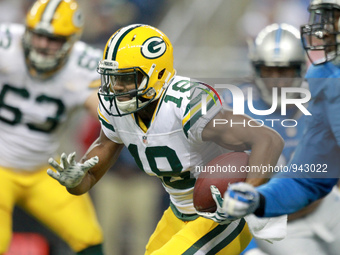 Green Bay Packers wide receiver Randall Cobb (18) runs the ball during the first half of an NFL football game against the Detroit Lions in D...