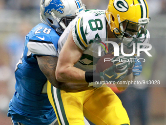 Green Bay Packers wide receiver Jared Abbrederis (84) is tackled Detroit Lions cornerback Quandre Diggs (28) during the first half of an NFL...