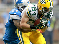 Green Bay Packers wide receiver Jared Abbrederis (84) is tackled Detroit Lions cornerback Quandre Diggs (28) during the first half of an NFL...