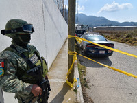 Forensic experts of the State of Mexico carry out the diligences where were found in a clandestine grave inside an industrial warehouse at l...