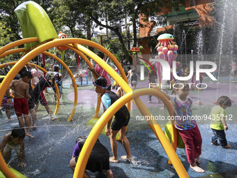 Children play in the water during the National Children's Day event inside children's museum in Bangkok, Thailand, 14 January 2023. Children...