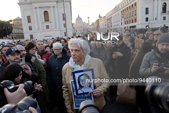 Pietro Orlandi, brother of Manuela Orlandi, the Vatican citizen girl disappeared mysteriously on June 22 1983, holds a banner with the imag...