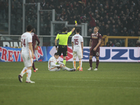 The referee warns Kamil Glik   during the Seria A match  between Torino FC and AS Roma at the olympic stadium of turin on december 5, 2015 i...