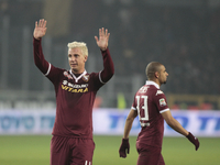 Maxi Lopez and Bruno Peres  at the end  the Seria A match  between Torino FC and AS Roma at the olympic stadium of turin on december 5, 2015...