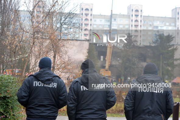 BROVARY, UKRAINE - JANUARY 18, 2023 - Three police officers are pictured at the scene of the fatal helicopter crash at a kindergarten in Bro...