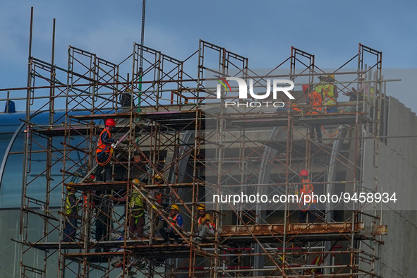 A construction worker working in a newly built building in Colombo, Sri Lanka, on January 18, 2023. 