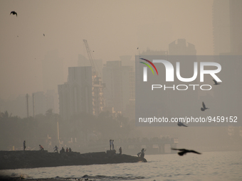 Highrise buildings are seen partially through dense smog in Mumbai, India, 18 January, 2023. Mumbai's Air Quality Index in Mumbai was very p...