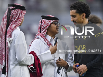 Paris Saint-Germain's Marquinhos interacts with a fans after the team training session at Khalifa International Stadium in Doha ,Qatar on 18...