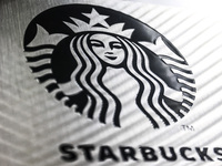 Starbucks Coffee logo is  seen on a coffeeshop in Krakow, Poland on January 13, 2023. (