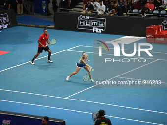MANILA, Philippines - Belinda Bencic and Nick Krygios of the OUE Singapore Slammers return the ball to their opponents Mirjana Lucic-Baroni...