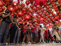 Thai and Chinese people pray for good at a Chinese temple during celebrations for the Lunar New Year in Bangkok, Thailand, 20 January 2023....