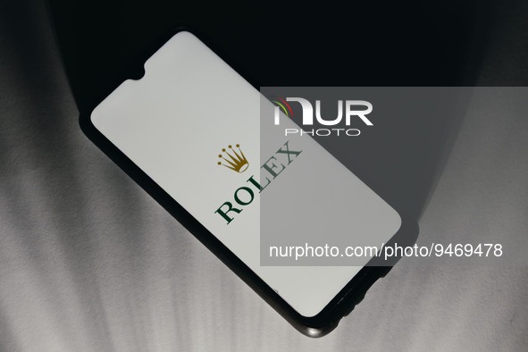 In this photo illustration a Rolex logo is displayed on a smartphone screen in Athens, Greece on January 20, 2023. 