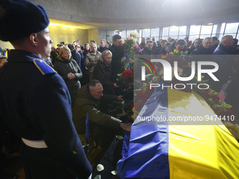 Ukrainians take part at a farewell ceremony for Ukrainian Internal Affairs Minister Denys Monastyrsky, first Deputy Minister Yevhenii Yenin,...