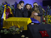 President of Ukraine Volodymyr Zelensky and his wife Olena Zelenska at the burial ceremony of those killed in the January 18 helicopter cras...