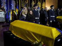 Funeral ceremonies for the victims of the January 18 helicopter crash in Kyiv, Ukraine, on January 21, 2023Funeral ceremonies for the victim...