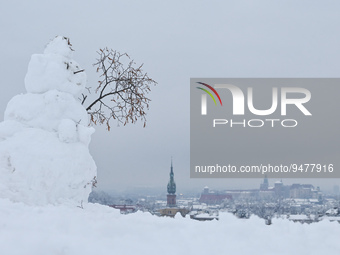 A snowman near the Krakus Mound overlooking the Old Town of Krakow and Podgorze district, in Krakow, Poland, on January 21, 2023.
Since Thur...