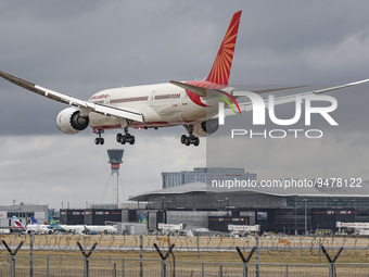 Air India Boeing 787 Dreamliner aircraft as seen on final approach flying for landing at the runway of London Heathrow airport during a clou...