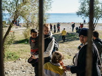 Migrants approach the coast of the northeastern Greek island of Lesbos on Thursday, Dec. 7, 2015. About 5,000 migrants are reaching Europe e...