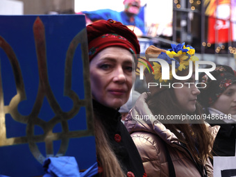 Supporters of Ukraine demonstrate during a “United By Freedom” rally in Times Square on January 22, 2023 in New York City, USA. Ukrainian go...