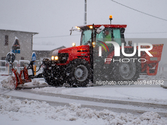 Snow plows and strewers clean the streets in Rieti, Italy on 23 January 2023 after heavy snowfall.  (