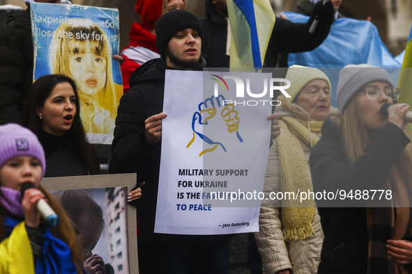 Ukrainian citizens and supporters attend a demonstration of solidarity with Ukraine while celebrating Ukrainian Unity Day on day 333 of Russ...