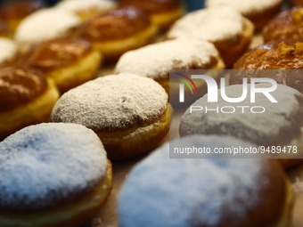 Traditional polish donuts called Paczki are seen in at a store in Krakow, Poland on January 23, 2023. (