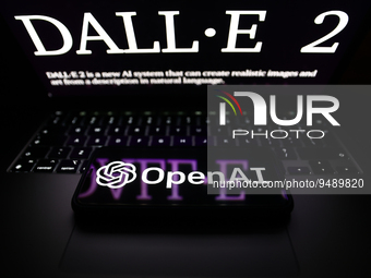 DALL-E 2 website displayed on a laptop screen and OpenAI logo displayed on a phone screen are seen in this illustration photo taken in Krako...