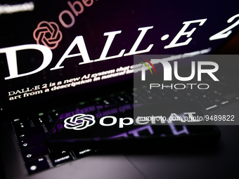 DALL-E 2 website displayed on a laptop screen and OpenAI logo displayed on a phone screen are seen in this illustration photo taken in Krako...