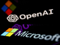 OpenAI logo displayed on a laptop screen and Microsoft logo displayed on a phone screen are seen in this illustration photo taken in Krakow,...