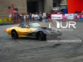 A Chevrolet Corvette Stingray performs a drift and burnout show during the MCM Car Show in Bogota, Colombia, the biggest auto show in latin...