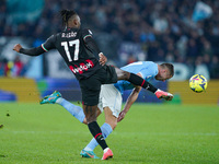 Rafael Leao of AC Milan and Adam Marusic of SS Lazio compete for the ball during the Serie A match between SS Lazio and AC Milan at Stadio O...