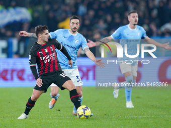 Brahim Diaz of AC Milan and Danilo Cataldi of SS Lazio compete for the ball during the Serie A match between SS Lazio and AC Milan at Stadio...