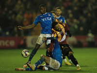 Stockports Akill Wright battles with Bradfords Tolaji Bola during the Sky Bet League 2 match between Stockport County and Bradford City at t...