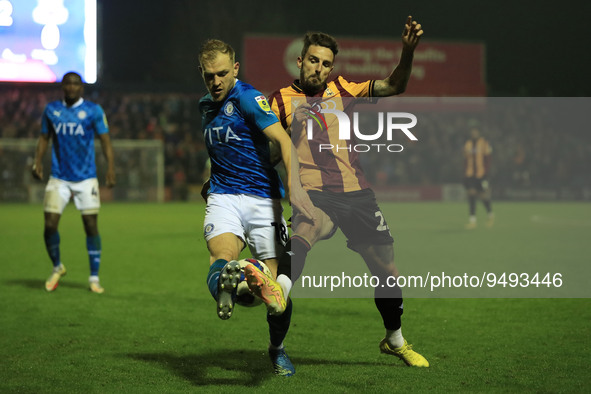 Stockports Ryan Croasdale clashes with Bradfords Romoney Crichlow during the Sky Bet League 2 match between Stockport County and Bradford Ci...