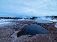 Strokkur in the Geysir Geothermal Area during the winter season in Iceland, on January 23, 2023.  (