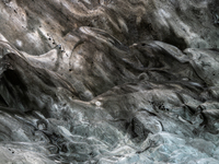 A detail of the ice cave in the glacial tongue Breiðamerkurjökull in the Vatnajokull Glacier National Park in Vatnajökull, Iceland, on Janua...