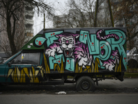 A tiger painted on a van is seen with a flat tire in the Praga district in Warsaw, Poland on 26 January, 2022. More than 500 ideas have been...