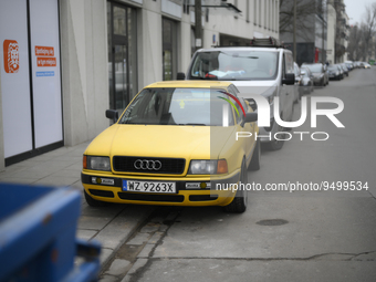 A bright yellow Audio 80 is seen in parked in the Praga district in Warsaw, Poland on 26 January, 2022. More than 500 ideas have been submit...