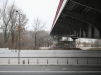 Graffiti is seen beneath the Slasko-Dabrowski bridge from the right bank of the Vistula river in Warsaw, Poland on 26 January, 2022. More th...