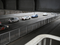 Traffic is seen beneath the Slasko-Dabrowski bridge on the right bank of the Vistula river in Warsaw, Poland on 26 January, 2022. More than...
