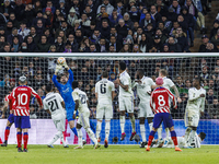 Thibaut Courtois of Real Madrid during the Copa del Rey match between Real Madrid and Atletico de Madrid at Estadio Santiago Bernabeu in Mad...