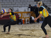 Katja Stam (L) and Raisa Schoon (R) of Netherlands react during the women's Volleyball World Beach Pro Tour Finals against Tanja Huberli  an...