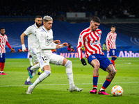Rodrigo De Paul (Atletico Madrid) and Federico Valverde (Real Madrid) in action during the football match between
Real Madrid and Atletico M...