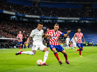 der Milito (Real Madrid) and Koke (Atletico Madrid) in action during the football match between
Real Madrid and Atletico Madrid called El De...