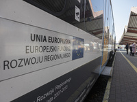 Logo of EU European Union on a train that is taking refugees to mainland Poland. War refugees from Ukraine arrive at Przemysl railway statio...