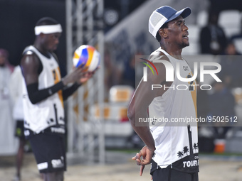 Cherif Younousse (L) and Ahmed Tijan (R) of Qatar action during the men's Volleyball World Beach Pro Tour Finals against Esteban Grimalt  a...